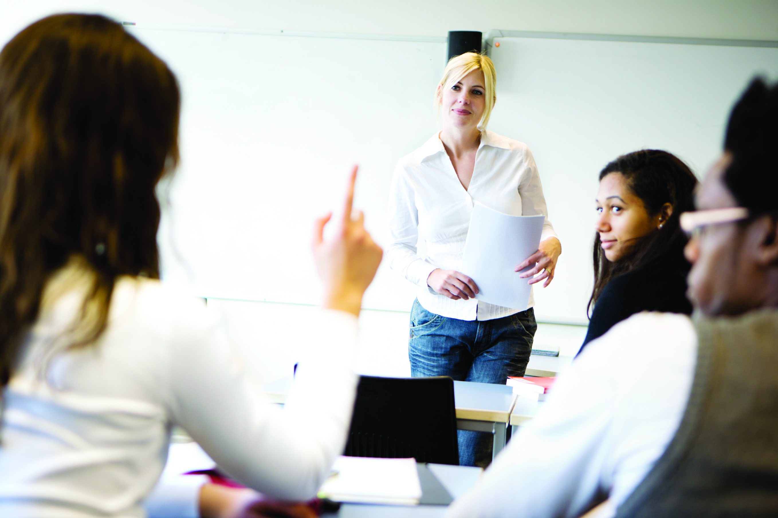 Classroom scene with teacher and students