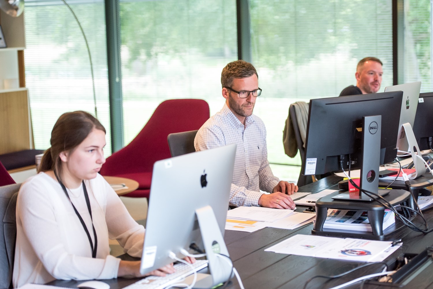 Office workers at their computers