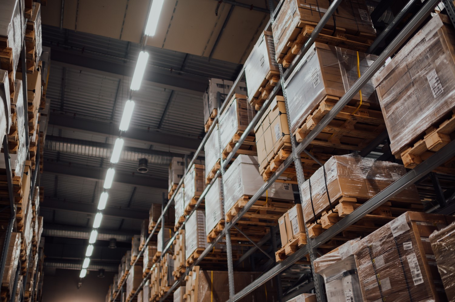 Warehouse shelves full with packages 